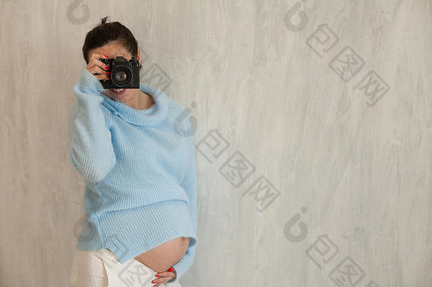 怀孕了女人摄影师电影相机