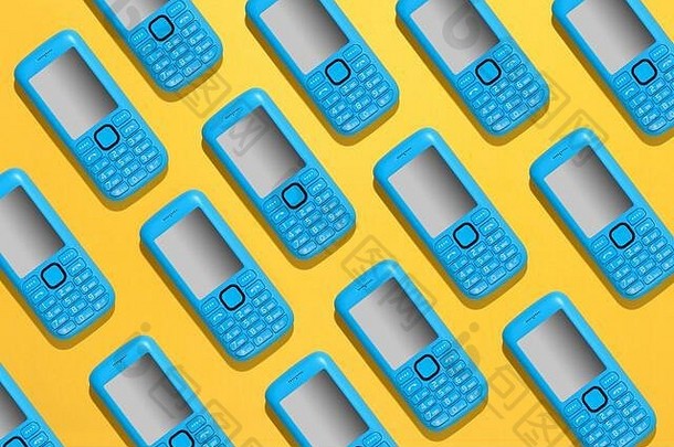色彩斑斓的蓝色的移动电话背景模式重复手机图标对角行明亮的黄色的背景