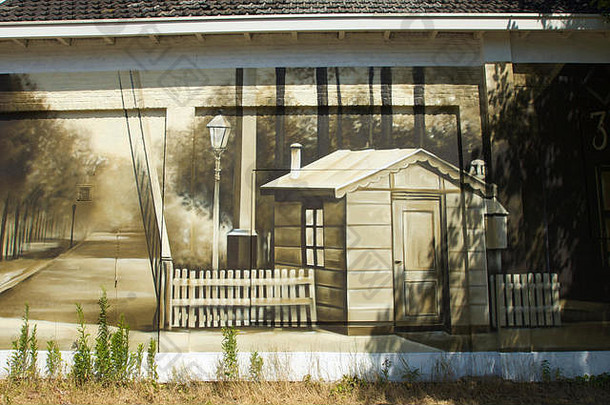 墙绘画房子铁路站当前的火车站巴恩荷兰