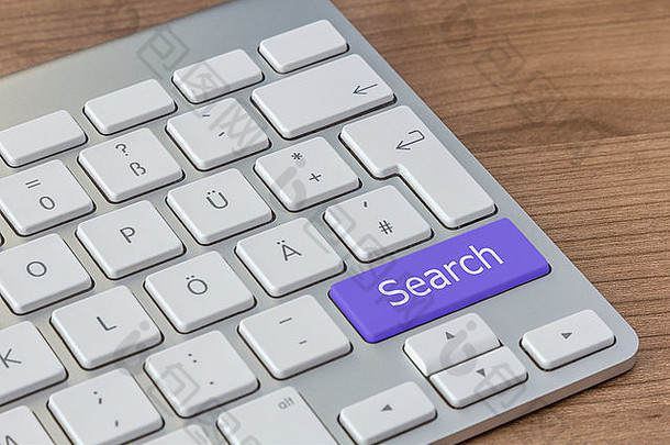 搜索写大蓝色的按钮现代键盘木桌面