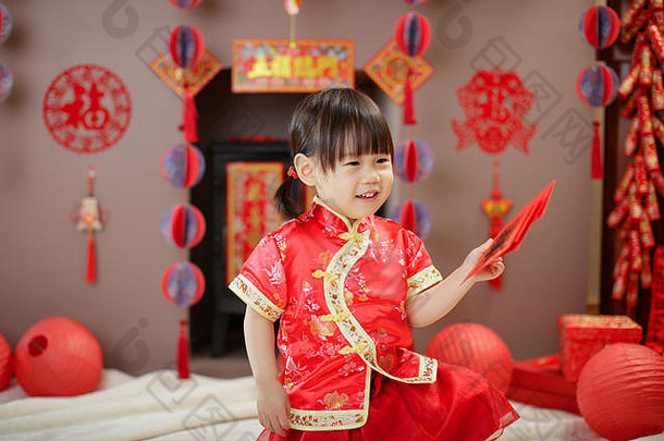 中国人婴儿女孩传统的沙拉酱意味着幸运的红色的信封种类意味着幸运的点缀问候卡引入