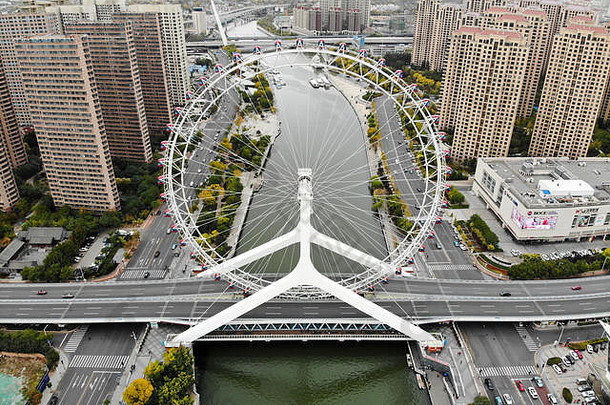 空中视图城市景观天津摩天轮著名的天津眼睛摩天轮yongle桥海河河受欢迎的现代具有里程碑意义的天津中国10月