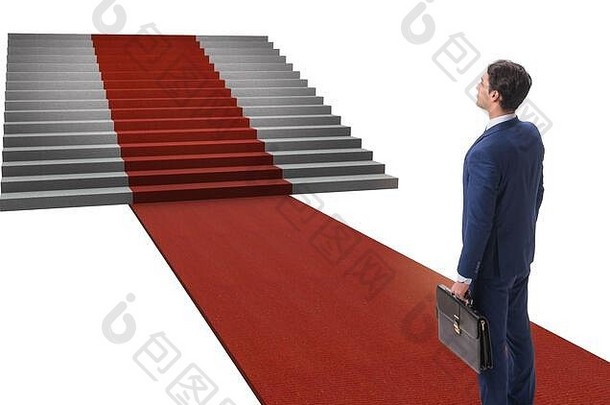 年轻的商人攀爬楼梯红色的地毯白色后台
