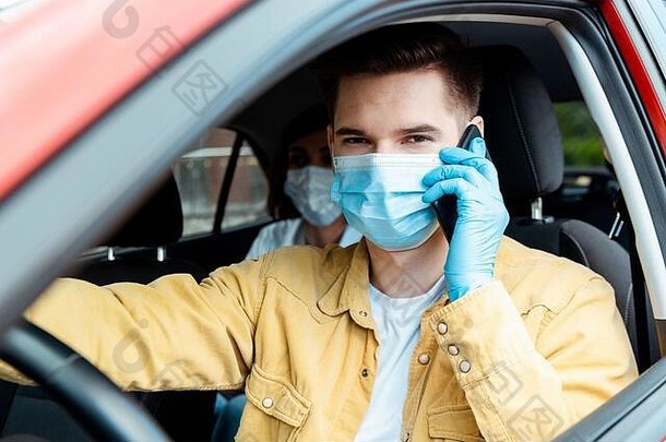 司机医疗面具手套会说话的手机出租车乘客科维德流感大流行