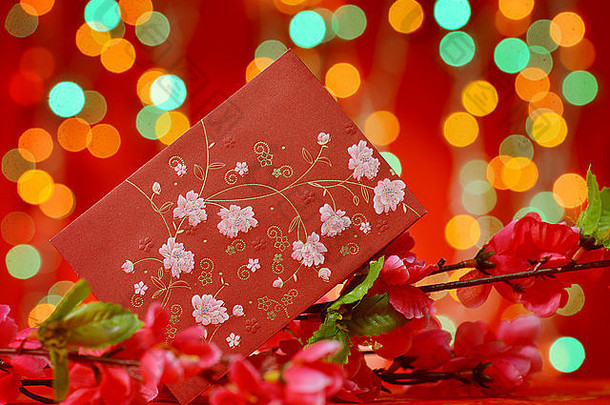 中国人一年节日装饰这战俘红色的包李子花