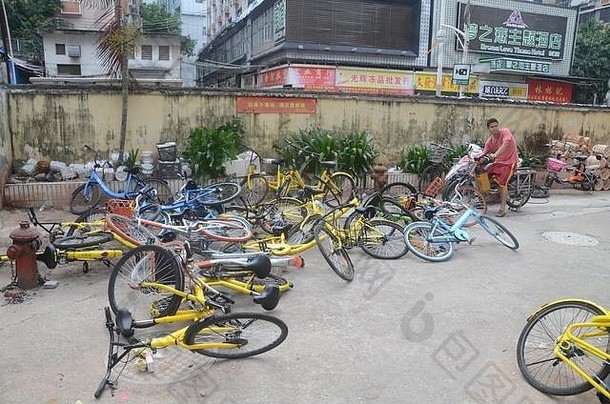 自行车分享中国移动奥福淹没了中国的街道周期支付移动电话代码图像深圳