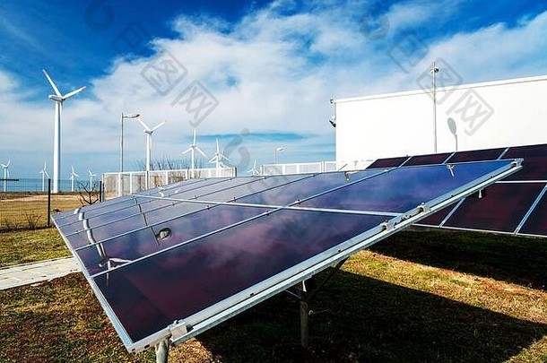 太阳能面板权力站风涡轮机背景概念可持续发展的资源
