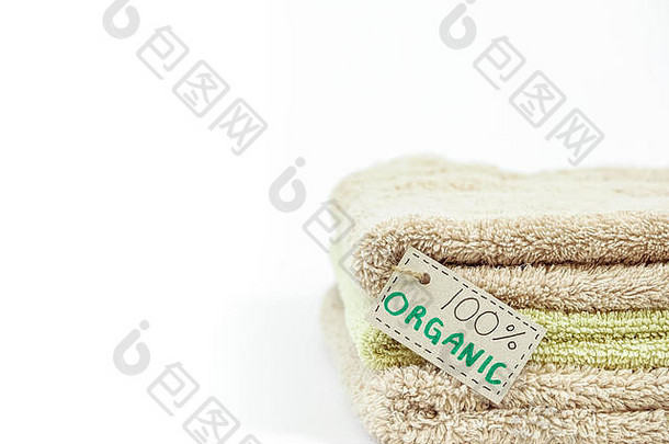 桩有机棉花浴毛巾白色背景生态纺织标签空白复制空间文本