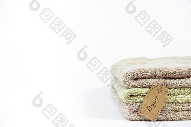 桩有机棉花浴毛巾白色背景生态纺织标签空白复制空间文本