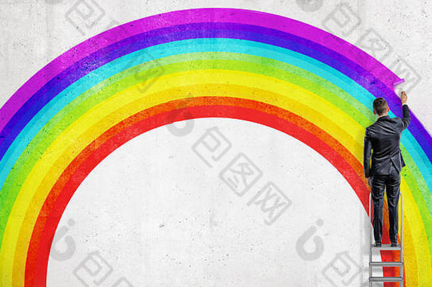 商人站活梯画色彩斑斓的行墙图片彩虹
