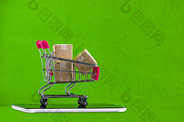 在线购物电子商务订单在线概念购物车产品纸箱盒子平板电脑绿色命令客户媒体
