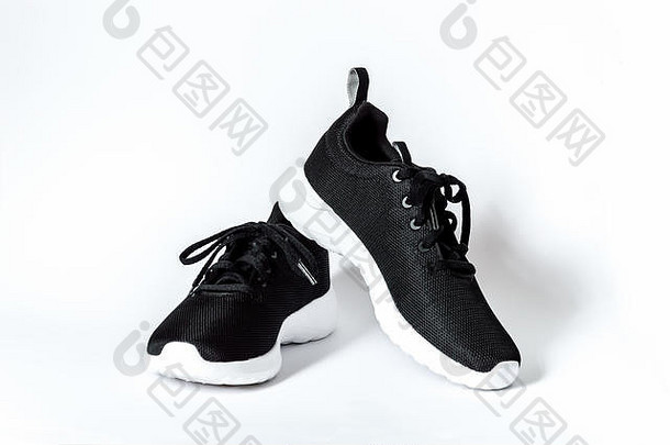 黑色的体育运行鞋子白色唯一的孤立的白色背景概念健身健康的生活方式