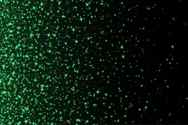 绿色闪光摘要发光的粒子闪闪发光的星尘号黑暗背景飞行圣诞节的目光火花