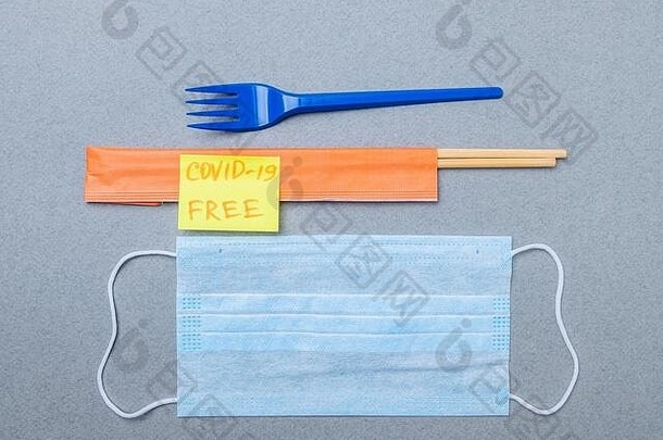 叉筷子<strong>医疗</strong>面具贴纸登记科维德免费的灰色的背景概念交付安全未受感染的食物