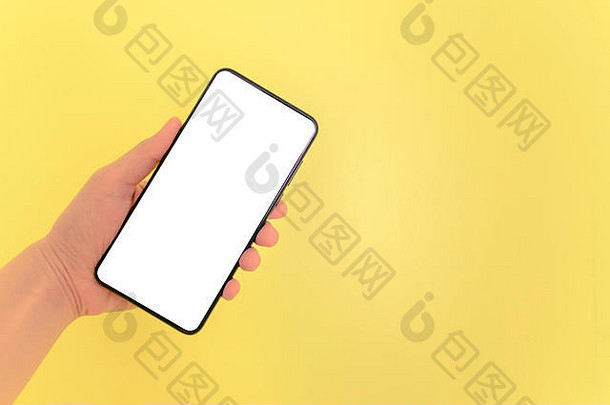 人类手持有智能手机白色屏幕背景移动电话白色屏幕背景孤立的概念业务购物