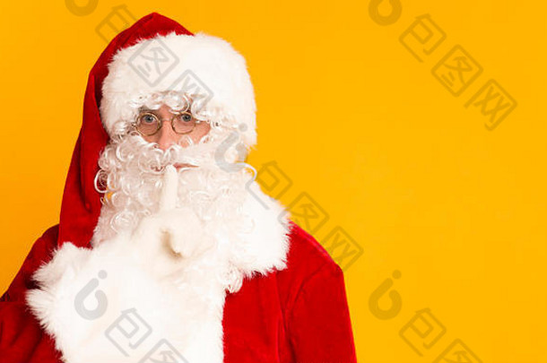 圣诞老人老人橙色背景持有手指口