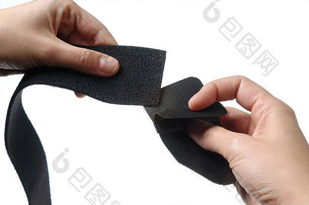细节手Velcro是一个粘扣带或魔术贴品牌的商标。Velcro?是Velcro BVBA的注册商标