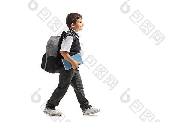 完整的长度配置文件拍摄小学生背包走孤立的白色背景