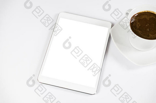 电脑平板电脑白色空屏幕咖啡平板电脑白色表格视图前特写镜头