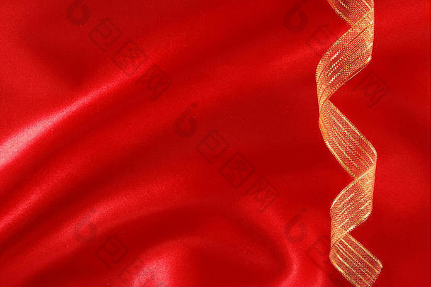 红色的丝绸金丝带背景