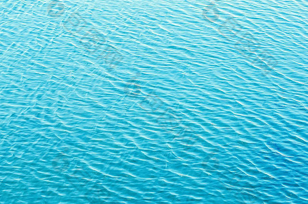 闪亮的蓝色的波浪水表面涟漪背景背景