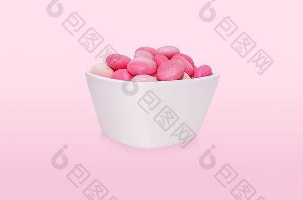 集团粉红色的滴糖果碗孤立的粉红色的背景