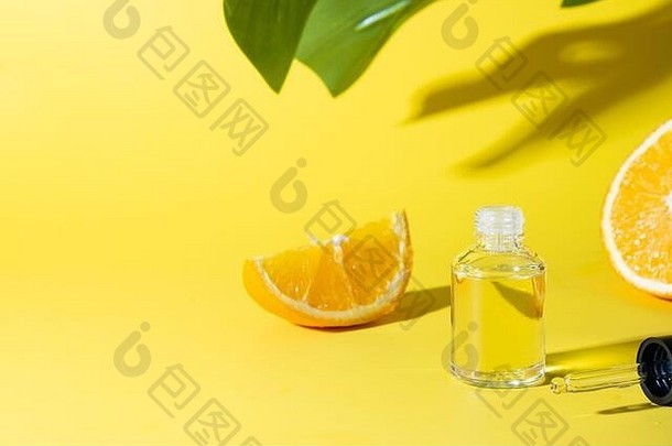 化妆品透明质酸酸保湿石油橙色本质黄色的背景关闭抗蜂窝织护理