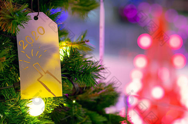 纸挂圣诞节树假期装饰色彩斑斓的灯背景