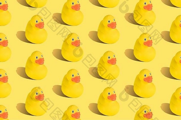 橡胶鸭无缝的模式黄色的背景最小的有创意的概念