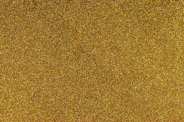 闪闪发光的黄金纸表纹理背景闪闪发光的金黄色的模式