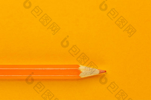 橙色铅笔橙色背景美丽的单色效果