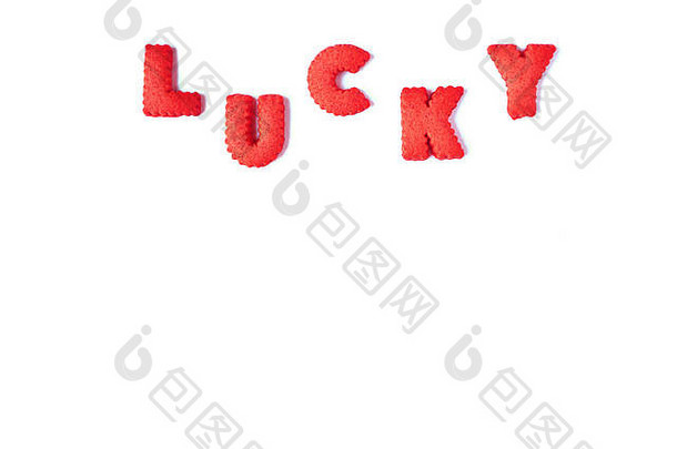 词幸运的拼写红色的彩色的字母形状的饼干白色背景