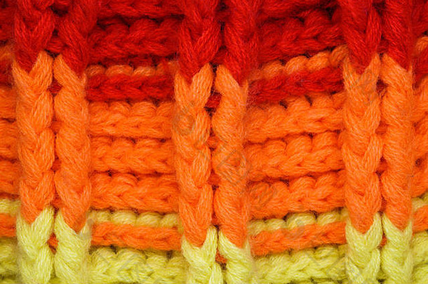 五彩缤纷的针织品毛衣织物纹理明亮的饱和背景