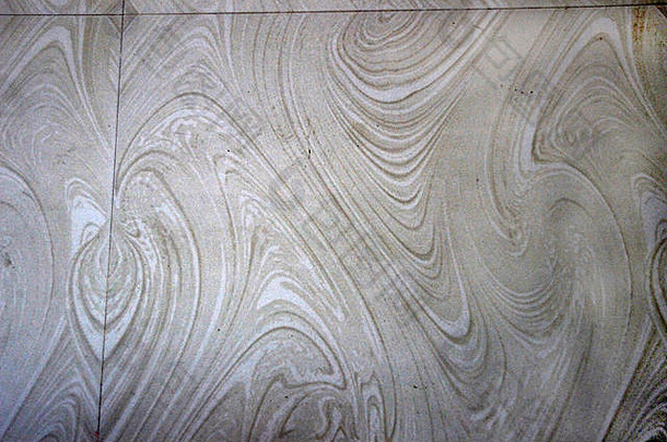 大理石地板的特写镜头，具有美丽、流畅、卷曲的纹理结构