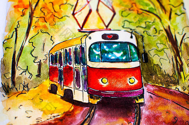 红色有轨电车沿着这条路线穿过秋天的森林。有轨电车的美丽秋景。