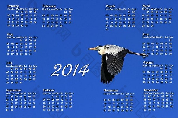 2014年英语日历，日出时苍鹭在深蓝色的天空中飞翔
