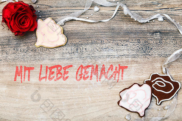 玫瑰饼干红色的开花德国文本用爱做了意味着使爱