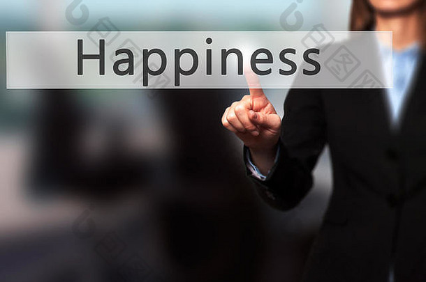 幸福-女商人手按触摸屏界面上的按钮。商业、技术、互联网概念。库存照片