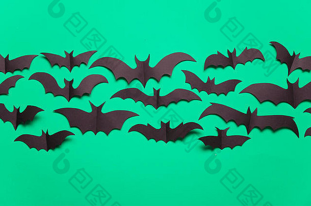 万圣节纸吸血鬼蝙蝠装饰绿色背景