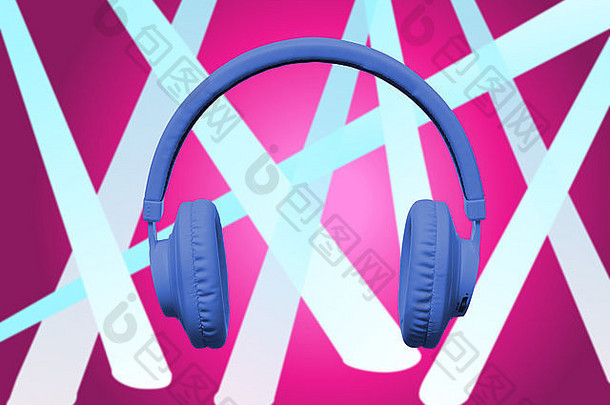 粉色聚光灯背景上的蓝色耳机
