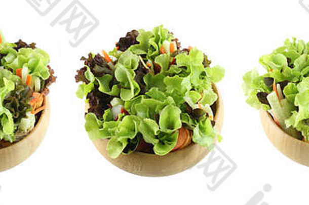 木制碗中的蔬菜沙拉，为爱健康的人准备，背景为白色，有剪纸路径。