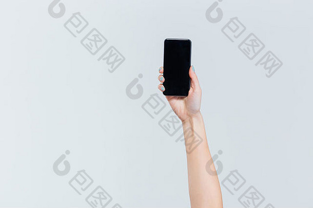 女手持有智能手机空白屏幕孤立的白色背景