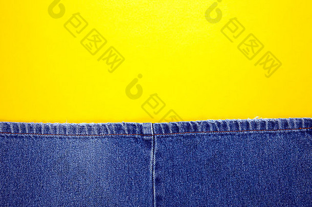 蓝色的牛仔裤黄色的针黄色的背景