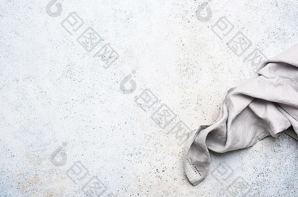灰色亚麻厨房餐巾混凝土背景折叠桌布设计背景