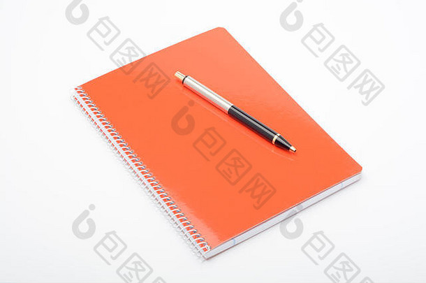 橙色笔记本笔白色背景
