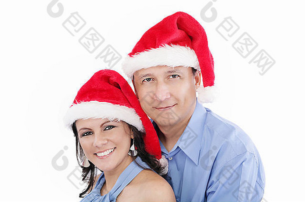 年轻的快乐可爱的夫妇祝快乐圣诞节