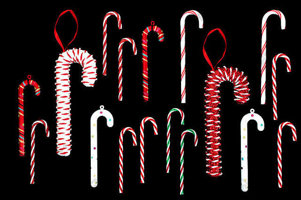 黑色背景的圣诞糖果手杖系列。顶视图。节日期间的圣诞卡。