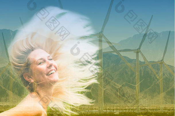 加利福尼亚沙漠中金发女人和风力涡轮机的双重曝光