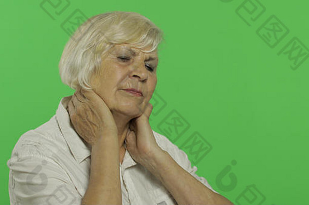 上了年纪的女人疼痛脖子麻烦漂亮的祖母白色衬衫的地方标志文本浓度关键绿色屏幕背景概念情绪