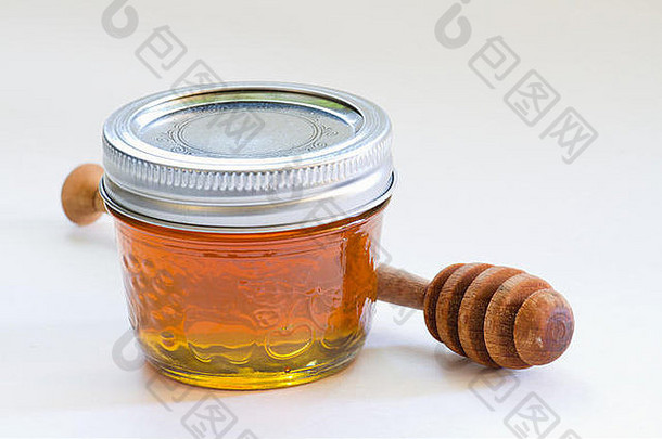 木制蜂蜜洒布器和有机蜂蜜